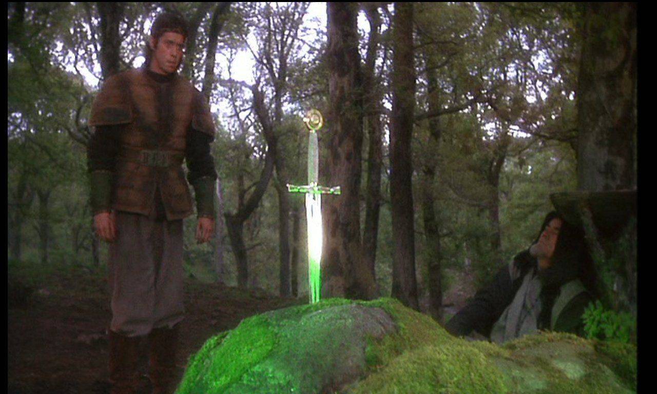 In a scene from Excalibur, Arthur gazes at the sword in the stone